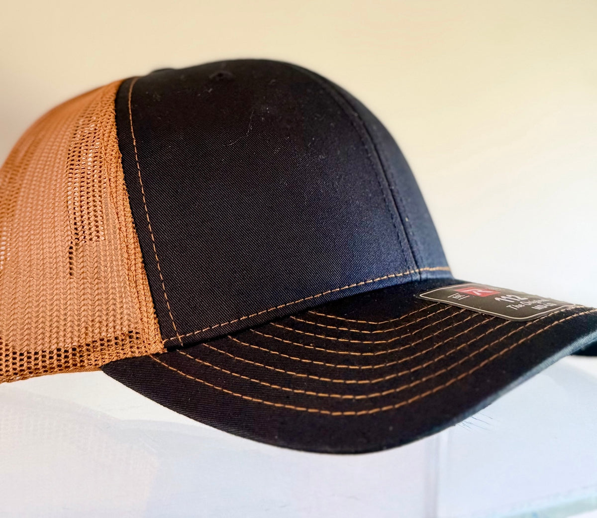 Richardson 112 Navy front with Caramel mesh
